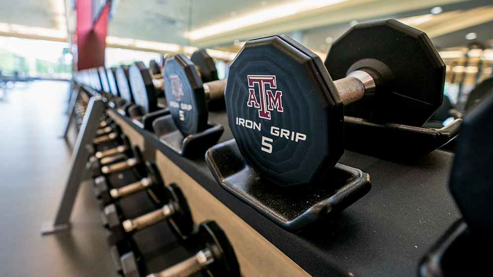 Weight with A&M logo in the recreation center.